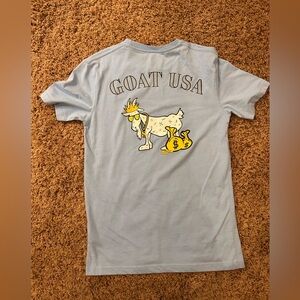 Light blue goat, USA T-shirt. Like new.